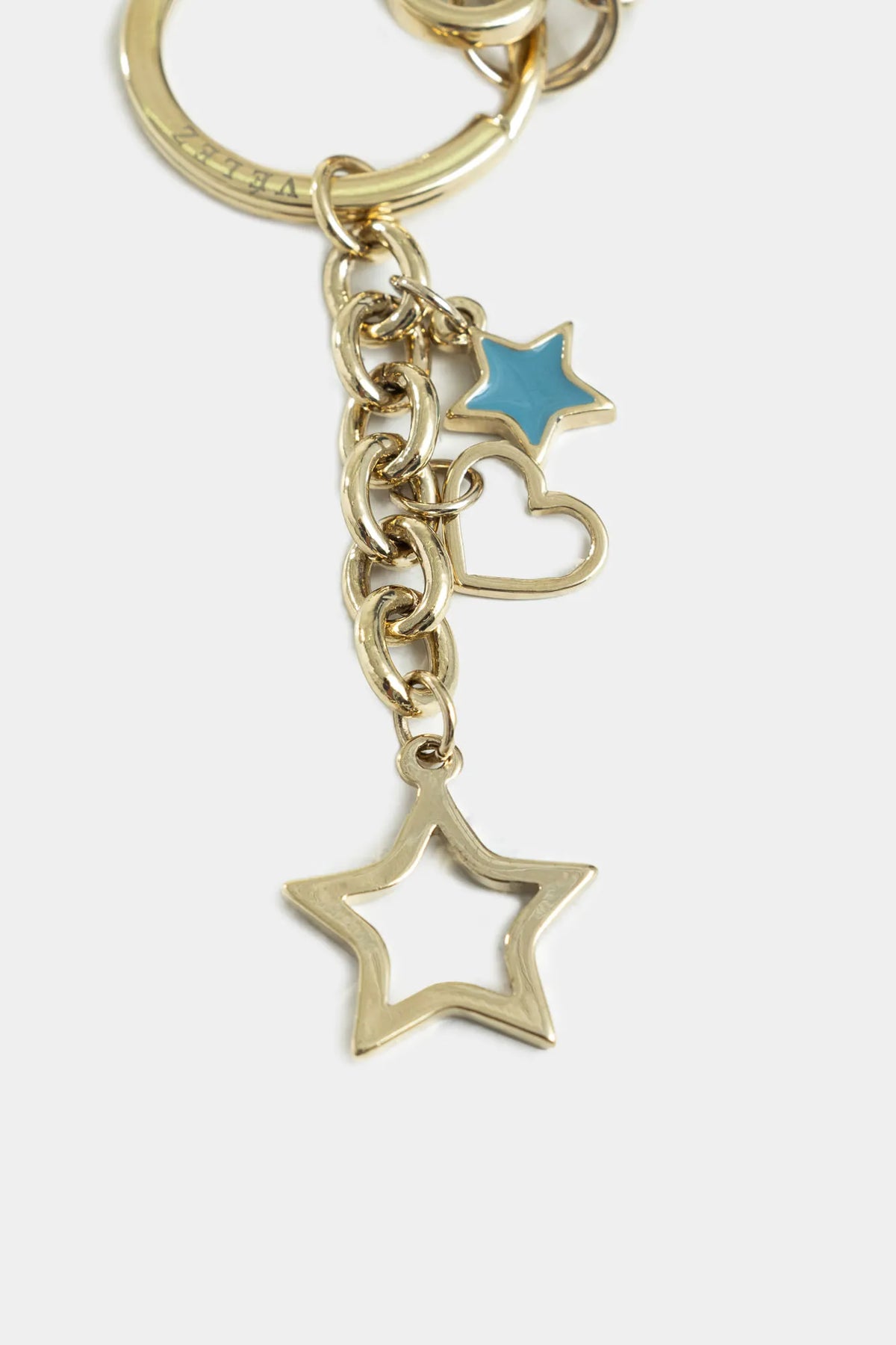 LLAVERO HEXAGONAL ZAMAK Y CUERO PARA MUJER CHARMS RESINA