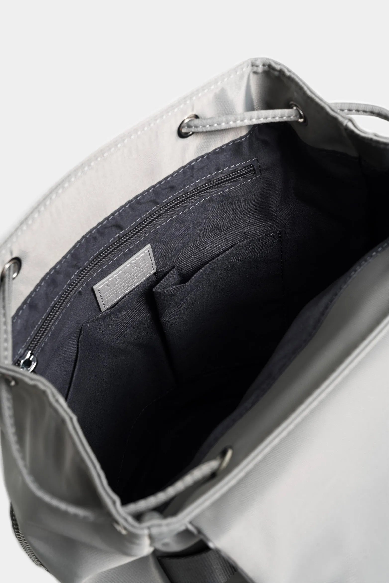 Mochila ibiza de lona y cuero para mujer chapa funcional