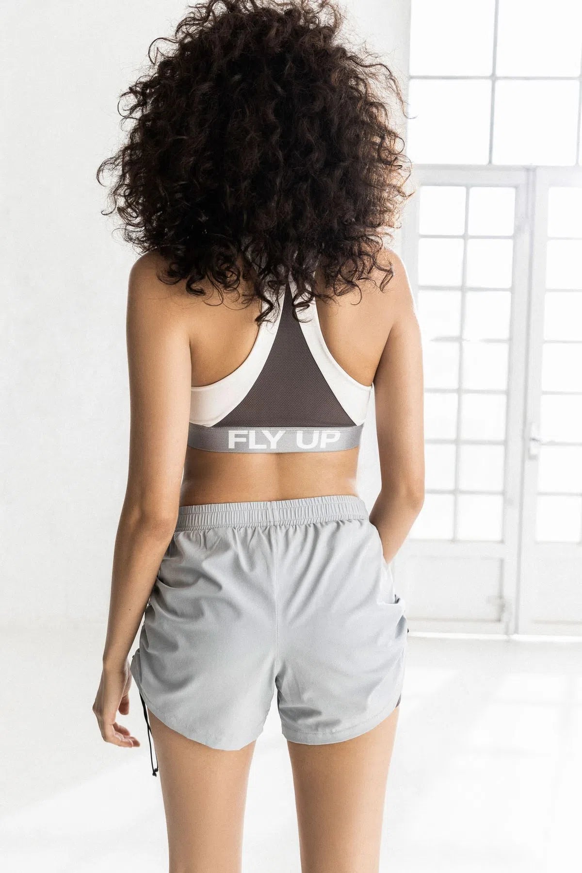 Top corto para mujer deportivo aireo tejido de punto