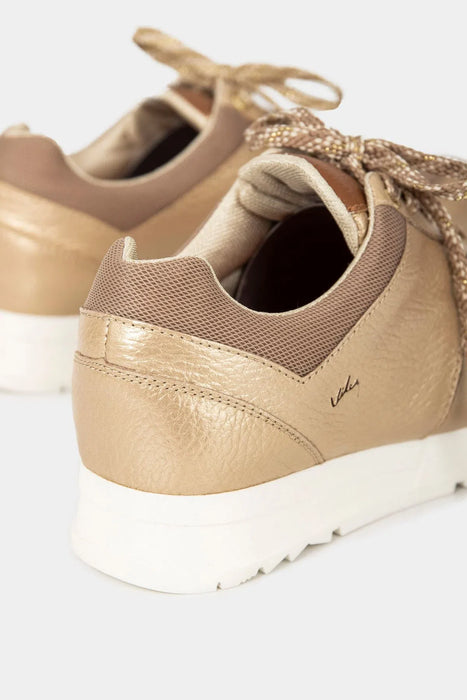 Tenis color dorado para mujer 2025