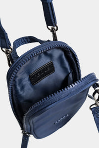 BOLSO TIPO MANOS LIBRES NAKAI S BASIC, PEQUEÑO EN TEXTIL CON JALADERAS EN CAUCHO