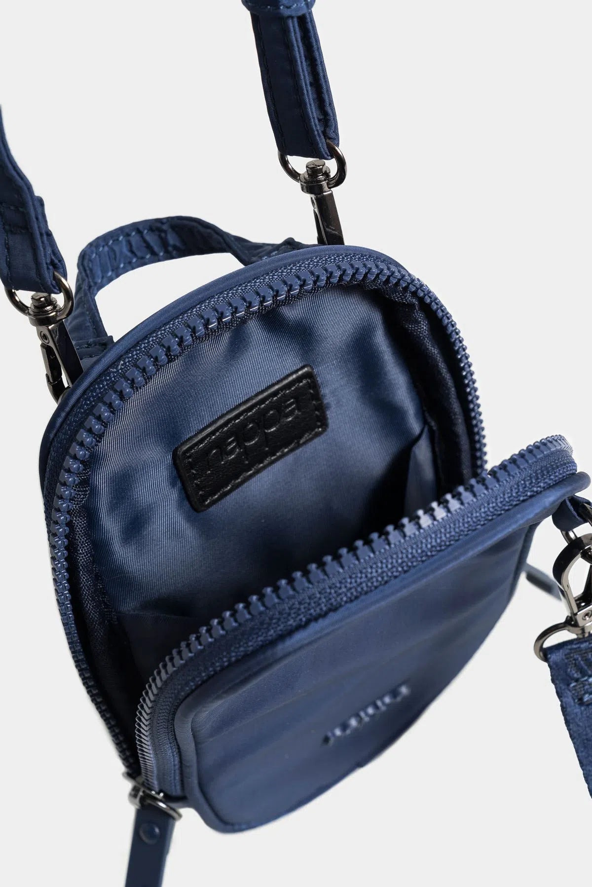 BOLSO TIPO MANOS LIBRES NAKAI S BASIC, PEQUEÑO EN TEXTIL CON JALADERAS EN CAUCHO